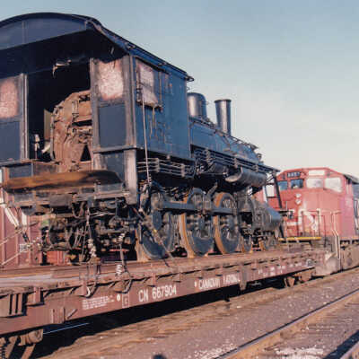 Photograph - Canadian National Steam Locomotive 152 being transported (Series of 49 Pictures)
