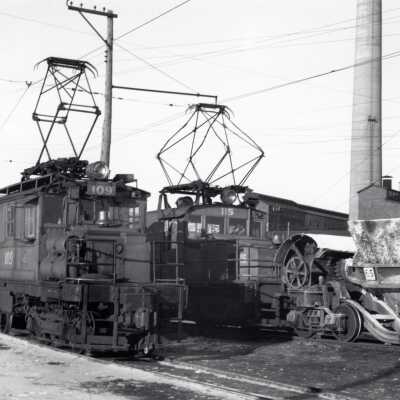 Photograph, Lower Yards, INCO Locomotives 109, 115, and Slag Pot 65.