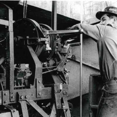 Photograph, Mine Employee Operating Machinery.