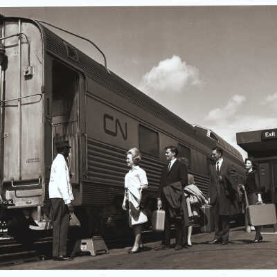 Photograph - Passengers boarding CN passenger car in Edmonton (?)