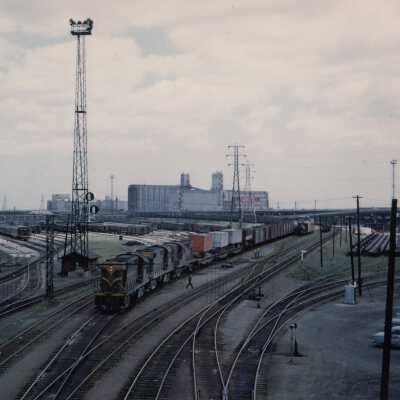 Photograph - Canadian National train in switching yard at the foot of Bathurst Street looking east, Toronto