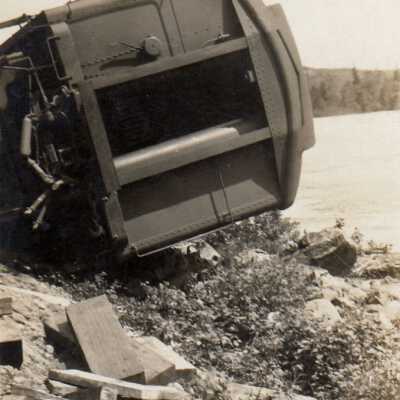Photograph- Tipped Over Passenger Car
