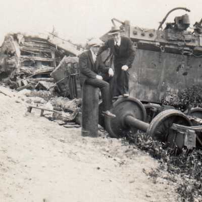Photograph-Two Men Posing on the Wheels of the Car
