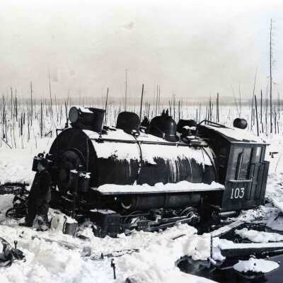 Photograph, Falconbridge Yard Locomotive 103, Used to Haul Molten Slag for Disposal, Fallen 25 Meters Down the Slag Pile into a Marsh.