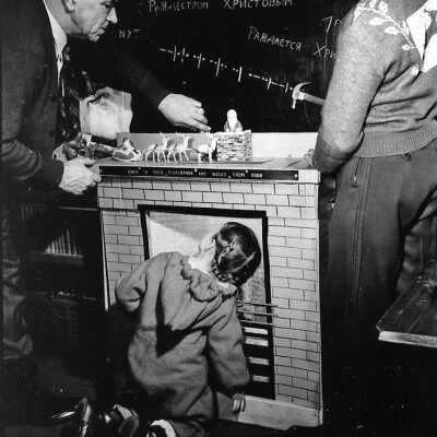 Photograph - Fred Sloman and students decorating the school car for Christmas