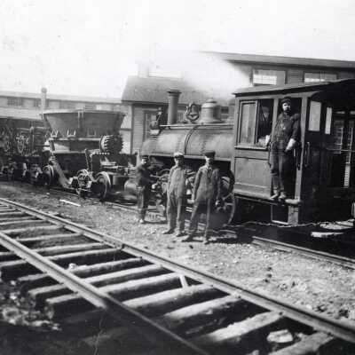 Photograph, Slag Cars With Locomotive.