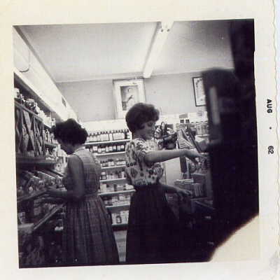 Photograph, Dippe Carisse, Mrs. Kristolovich, Lalonde's Drug Store, August 1962.