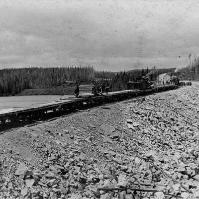 Photograph, Track laying outfit, Transcontinental Railway, Tuesday Lake Southwest of Lake Nipigon, Ontario, July 1909