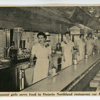 "Counter Girls Serve food in Ontario Northland restaurant car Meechim" in Railroad Magazine, December 1963