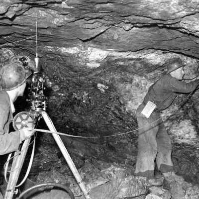 Photograph, Surveyors Mapping Drifts and Slopes in Order to Update Drawings.