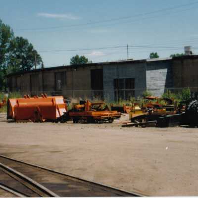 Photograph - Truck and tractor equipment in unidentified railyard