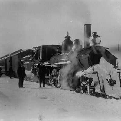 Photograph, Grand Trunk Railway Locomotive No. 2481 and passenger train in snow.