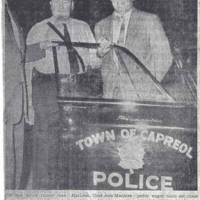 Photograph, Capreol Police Chief Alex MacAtee, Mayor John MacLean, Police Committee chairman Tom Short, 1962 Plymouth Belvedere Police Car, Caproel, Ontario.