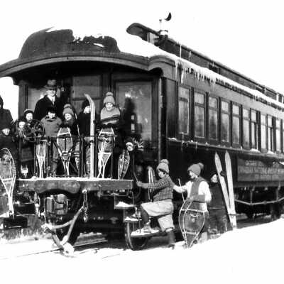 Photograph - Students with snow shoes on Canadian National school car