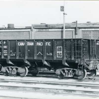 Photograph, Black Body, White Lettering.