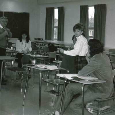 Photograph, Today's Lesson, How to Tie a Tie! Instructor, Professor Barry Williams, 1985.