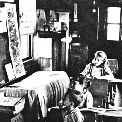 Photograph - Children being taught in a school car