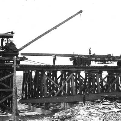 Photograph, BANC Hoist unloading steel.