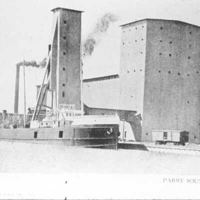 Photograph of Depot Harbour: Showing the Grain Elevator Loading a Steam Liner