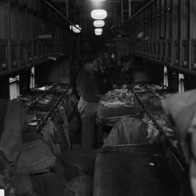 Photograph, Canadian National Railways (CNR) Mail Car - sorting mail.