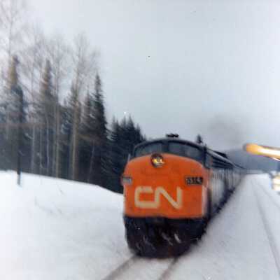 Photograph - Canadian National Diesel Locomotive 6514 Train No. 10 passing 103 at Ostrom, Feb. 1966