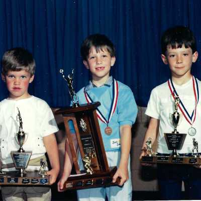 photograph of Individuals receiving trophies