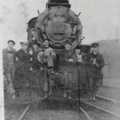 Photograph - Group posing on Canadian Northern steam locomotive no. 371