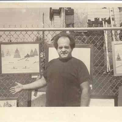 Ed Sinchak with student art display