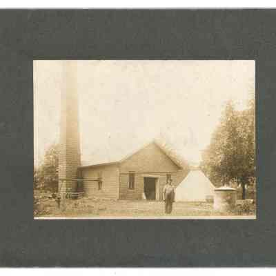 Amos Lawton standing in front of the waterworks