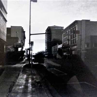 Untitled (street lamp and buildings)