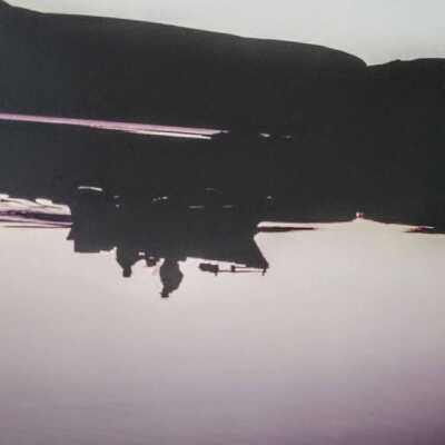 Untitled (boat on lake in dark)