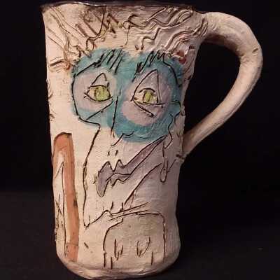 Untitled (crazy face pitcher)