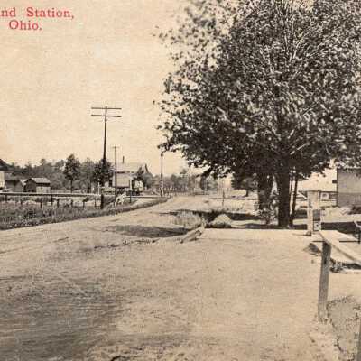 Postcard photo Spokane, Ohio, Post office and R. R. station
