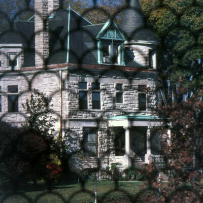 Elmhurst History Mausoleum in the Glos Mansion seen through Glos Mausoleum decorative trim