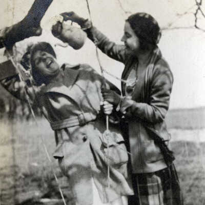 Young Women on Rope Swing