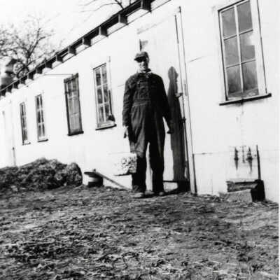 Paul Luessenhop outside chicken coop