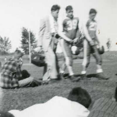 Immaculate Conception H.S. football coach and players at East End Park, 1948