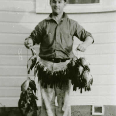 Unidentified man with fish