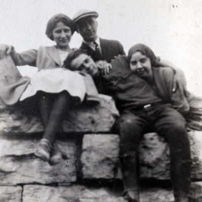 Young People on Stone Wall