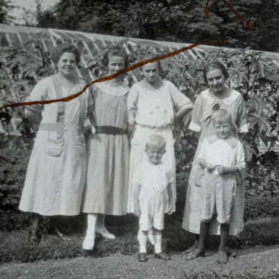 Women and Children at a Greenhouse