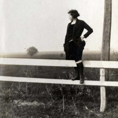 Girl on a Fence