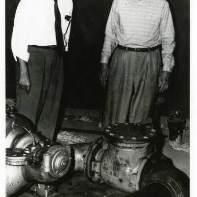City Employees at a Water Pump