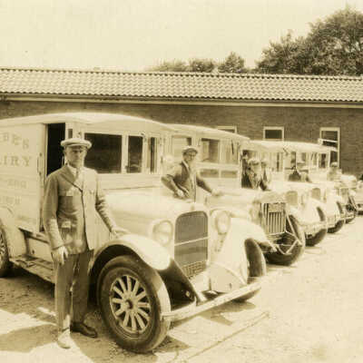 Rabe's Dairy delivery truck with drivers