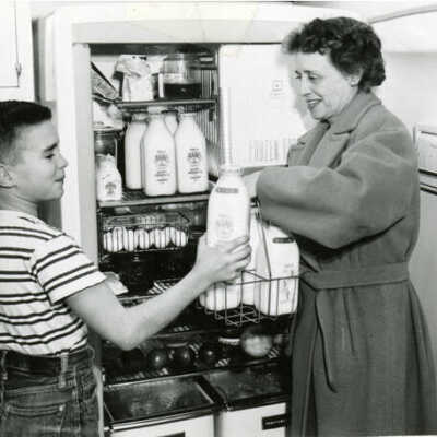 Boy with Rabe milk bottles