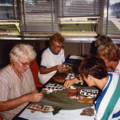 Elmhurst Piecemakers Members Working on Elmhurst Sesquicentennial Quilt