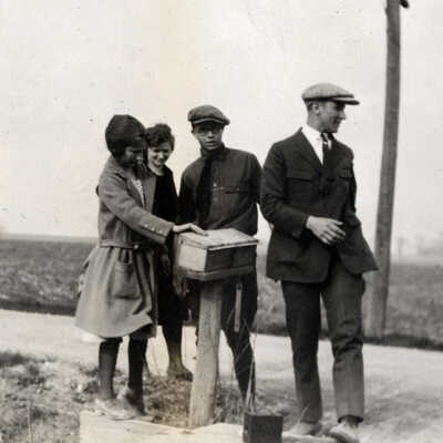 Young People Near a Mailbox on North Avenue
