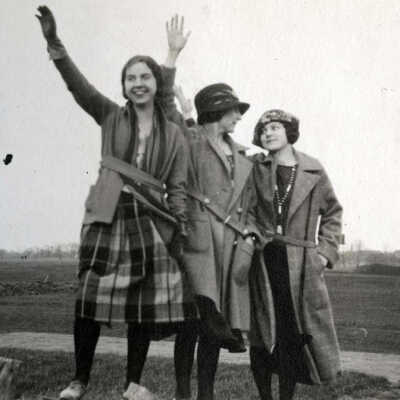 Three Young Women in a Field
