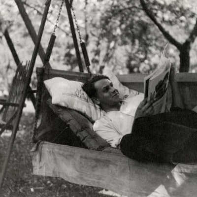 Young Man on Swing Bench