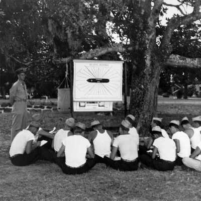 Operation Ivory Soap - classes at the Grand Hotel were conducted outside under the shade of the live oaks. 1944-1945
