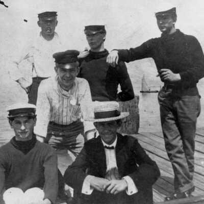 Bay boat crew and guest (?) on the dock at Point Clear circa early 1900's.